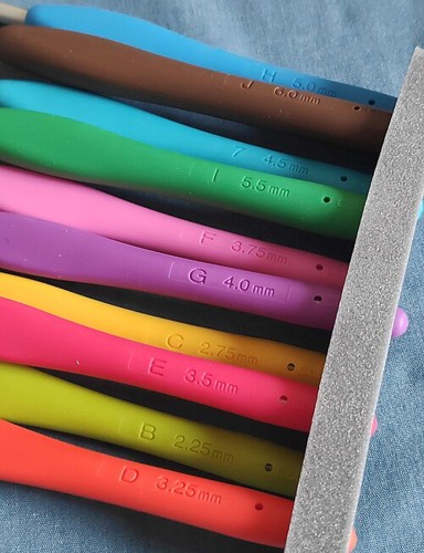 Colored crochet hook handles; illustrative category photo.